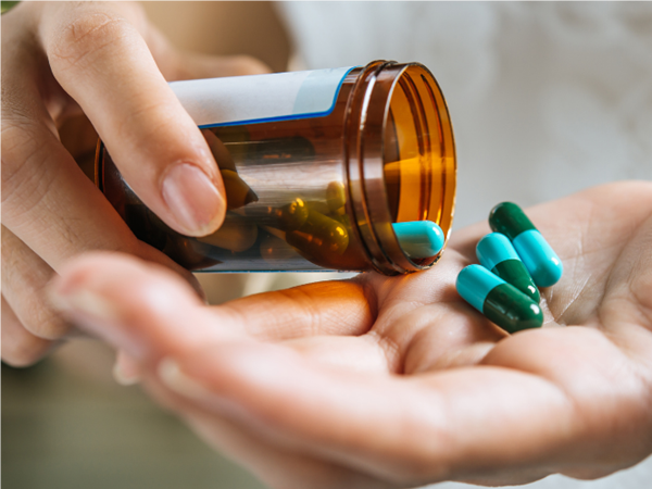 pills-on-a-hand